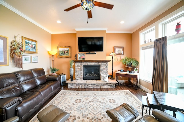 121 Choteau Ave NE, Great Falls, MT 59404 - living area with a ceiling fan, dark wood-style flooring, crown molding, a fireplace, and recessed lighting