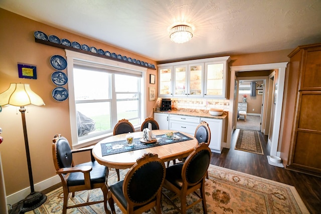 121 Choteau Ave NE, Great Falls, MT 59404 - dining space with baseboards and dark wood-type flooring