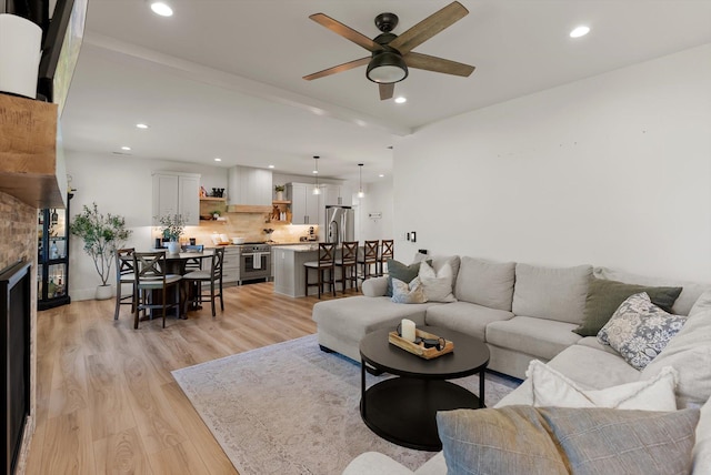 5519 Golf Dr, Lolo, MT 59847 - living area with a ceiling fan, recessed lighting, and light wood-type flooring