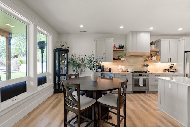 5519 Golf Dr, Lolo, MT 59847 - dining area featuring light wood-style flooring and recessed lighting