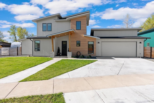5519 Golf Dr, Lolo, MT 59847 - view of front of home with an attached garage and driveway