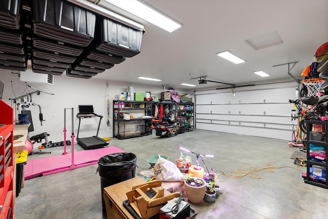 5519 Golf Dr, Lolo, MT 59847 - garage featuring a garage door opener