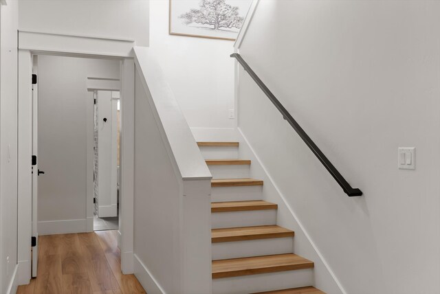 5519 Golf Dr, Lolo, MT 59847 - stairs with wood finished floors and baseboards