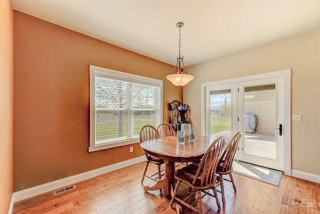 7175 Bootlegger Dr, Helena, MT 59602 - dining area featuring light wood-type flooring and baseboards
