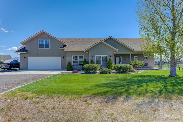 7175 Bootlegger Dr, Helena, MT 59602 - view of front facade featuring concrete driveway, board and batten siding, an attached garage, and a shingled roof