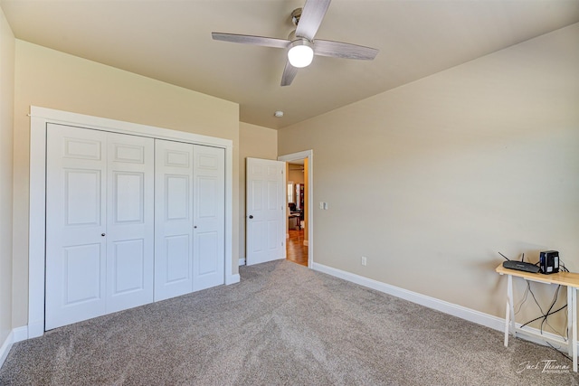 7175 Bootlegger Dr, Helena, MT 59602 - unfurnished bedroom featuring carpet flooring, baseboards, a closet, and a ceiling fan