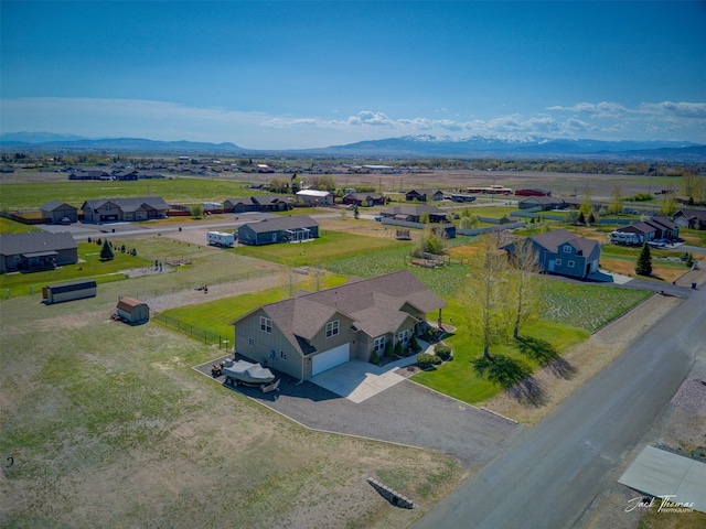 7175 Bootlegger Dr, Helena, MT 59602 - aerial view of residential area with a mountain backdrop