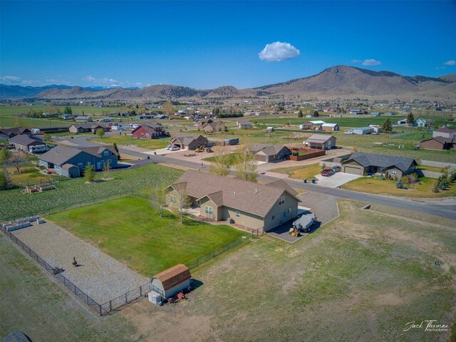 7175 Bootlegger Dr, Helena, MT 59602 - aerial perspective of suburban area featuring a mountain backdrop