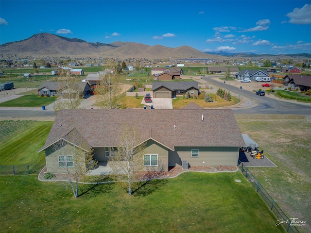 7175 Bootlegger Dr, Helena, MT 59602 - aerial perspective of suburban area with a mountain backdrop