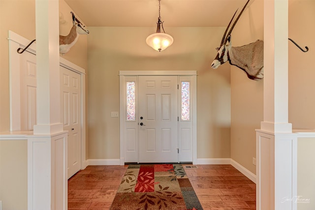 7175 Bootlegger Dr, Helena, MT 59602 - foyer featuring light wood finished floors and baseboards