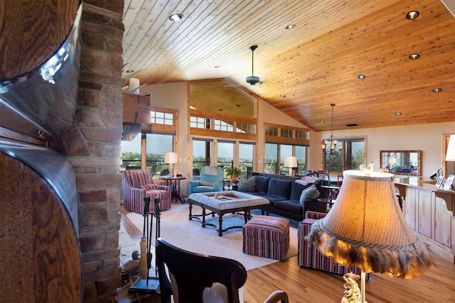 470 Salmon Way, Corvallis, MT 59828 - living area with plenty of natural light, lofted ceiling, wooden ceiling, wood finished floors, and a chandelier