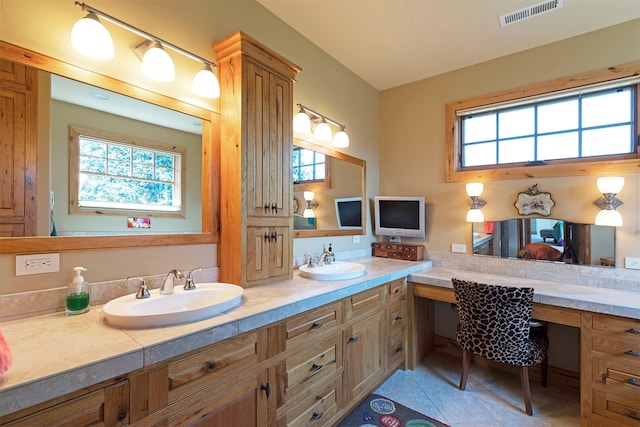 470 Salmon Way, Corvallis, MT 59828 - bathroom with healthy amount of natural light, double vanity, and tile patterned floors