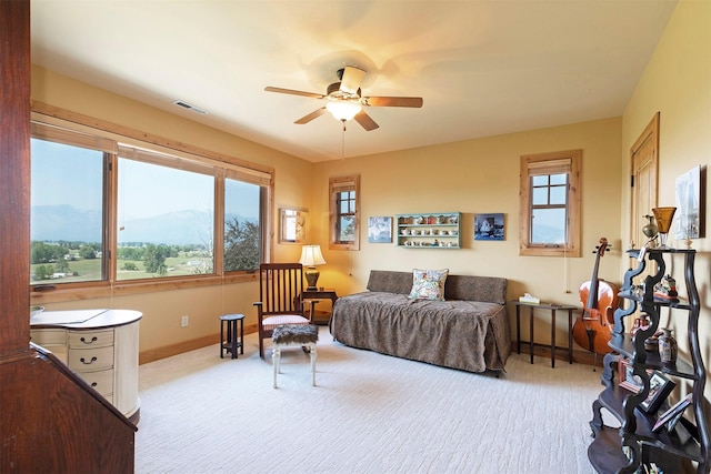 470 Salmon Way, Corvallis, MT 59828 - bedroom with carpet flooring, a mountain view, baseboards, and ceiling fan