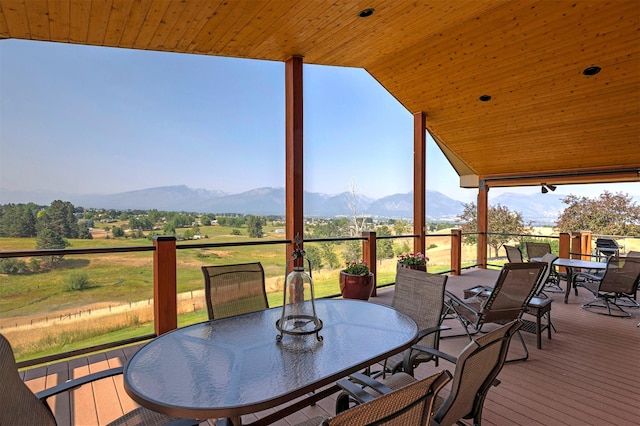 470 Salmon Way, Corvallis, MT 59828 - wooden deck with a mountain view and outdoor dining space