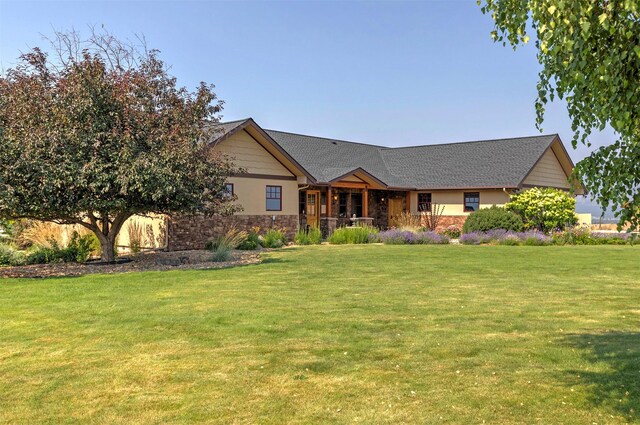 470 Salmon Way, Corvallis, MT 59828 - view of front of house with stone siding and a front lawn