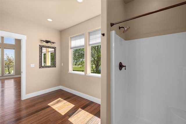 125 Schlegel View Rd, Kalispell, MT 59901 - bathroom with a shower, baseboards, wood finished floors, and recessed lighting
