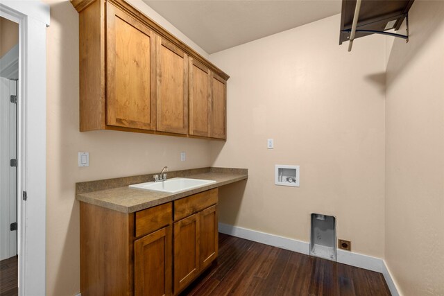 125 Schlegel View Rd, Kalispell, MT 59901 - washroom with cabinet space, hookup for a washing machine, dark wood-type flooring, and baseboards