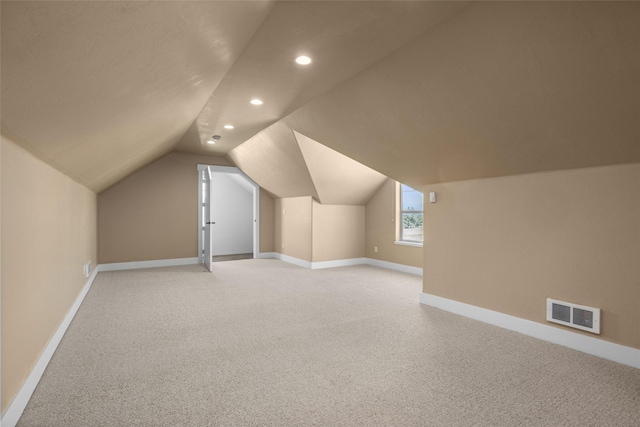 125 Schlegel View Rd, Kalispell, MT 59901 - bonus room featuring recessed lighting, vaulted ceiling, and light colored carpet