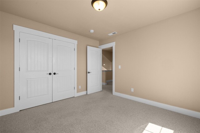 125 Schlegel View Rd, Kalispell, MT 59901 - unfurnished bedroom featuring carpet floors, baseboards, and a closet