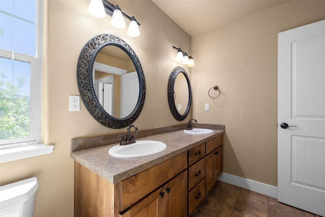 125 Schlegel View Rd, Kalispell, MT 59901 - bathroom with double vanity and tile patterned floors