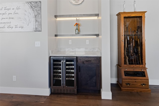 131 Owl Loop, Kalispell, MT 59901 - indoor dry bar with wine cooler and dark wood-style floors