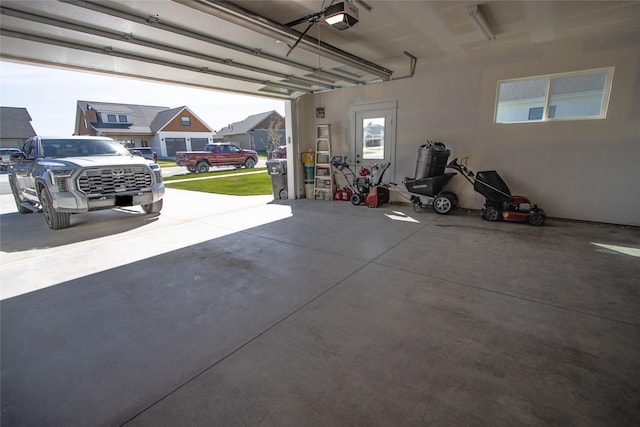 131 Owl Loop, Kalispell, MT 59901 - garage with a garage door opener and a residential view