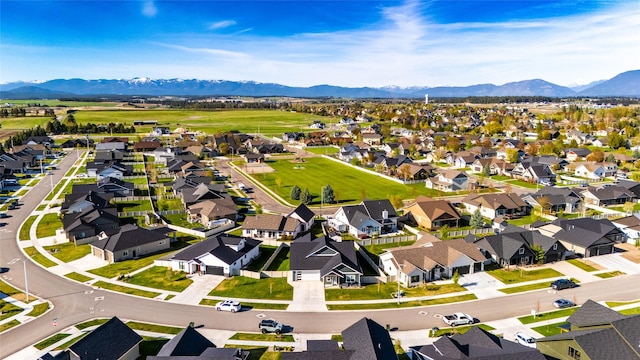 131 Owl Loop, Kalispell, MT 59901 - aerial perspective of suburban area with mountains