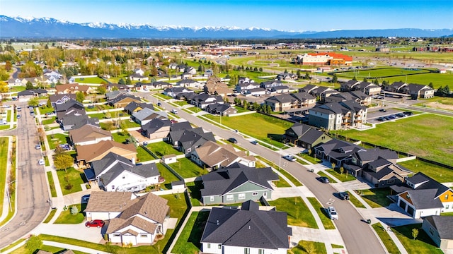 131 Owl Loop, Kalispell, MT 59901 - aerial view of residential area featuring a mountain backdrop