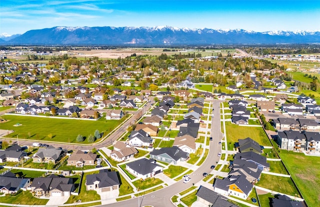 131 Owl Loop, Kalispell, MT 59901 - aerial perspective of suburban area with a mountainous background