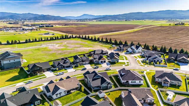 131 Owl Loop, Kalispell, MT 59901 - aerial perspective of suburban area with mountains