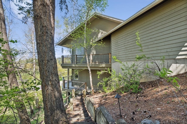 240 Eagle Bend Dr, Bigfork, MT 59911 - rear view of house with a balcony