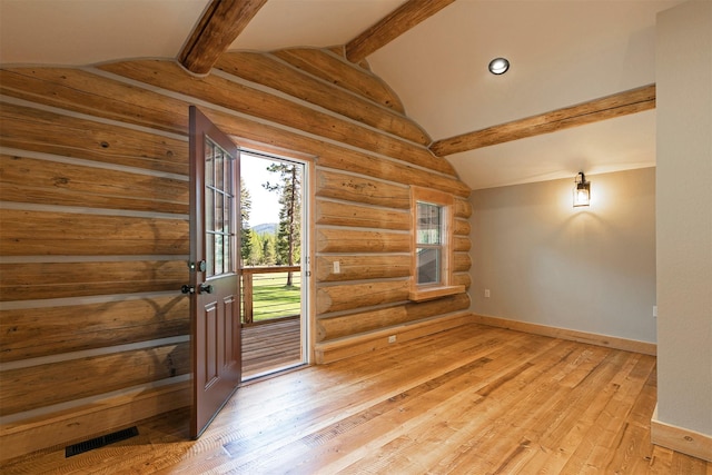 interior space featuring rustic walls, baseboards, light wood-style floors, and recessed lighting