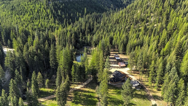 view from above of property featuring a forest