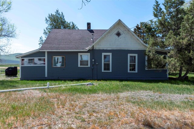 4 Ratcliff Rd, Hot Springs, MT 59845 - back of property with a chimney