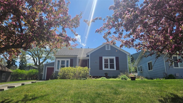915 Hauser Blvd, Helena, MT 59601 - view of front of house with a front lawn
