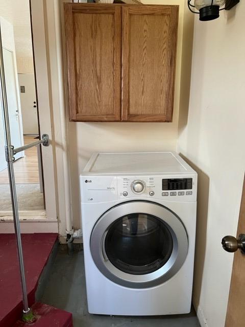 915 Hauser Blvd, Helena, MT 59601 - laundry room featuring washer / dryer and cabinet space
