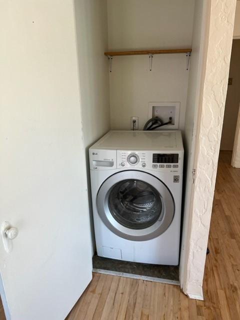 915 Hauser Blvd, Helena, MT 59601 - laundry room with washer / clothes dryer and light wood-style floors