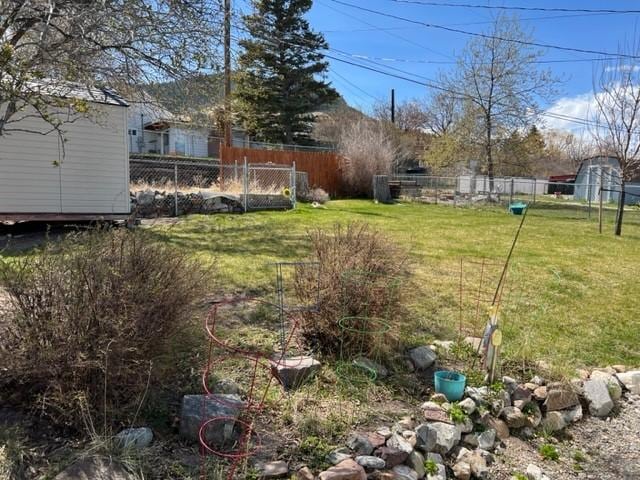 915 Hauser Blvd, Helena, MT 59601 - view of yard with an outbuilding and a storage unit