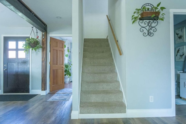 179 Fairmont Rd, Kalispell, MT 59901 - staircase with wood finished floors and baseboards