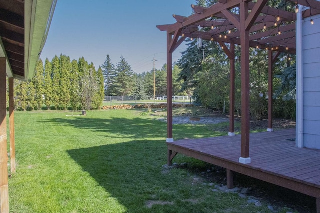 179 Fairmont Rd, Kalispell, MT 59901 - view of yard featuring a wooden deck and a pergola