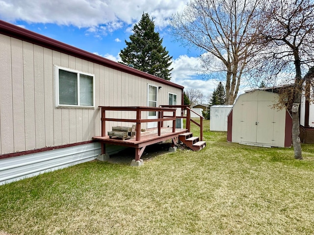 3000 Villard Ave Unit 80, Helena, MT 59601 - view of green lawn with a storage shed, a wooden deck, and an outdoor structure
