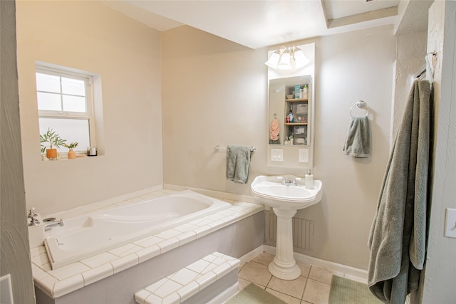 717 W Quartz St, Butte, MT 59701 - bathroom with tile patterned flooring, a garden tub, and baseboards