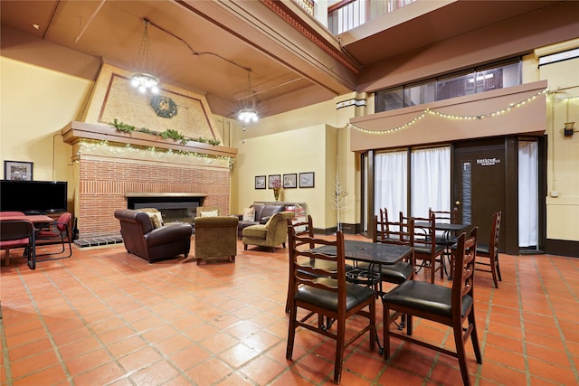 21 N Last Chance Gulch Gulch Unit 3L, Helena, MT 59601 - tiled dining space featuring a high ceiling and a fireplace