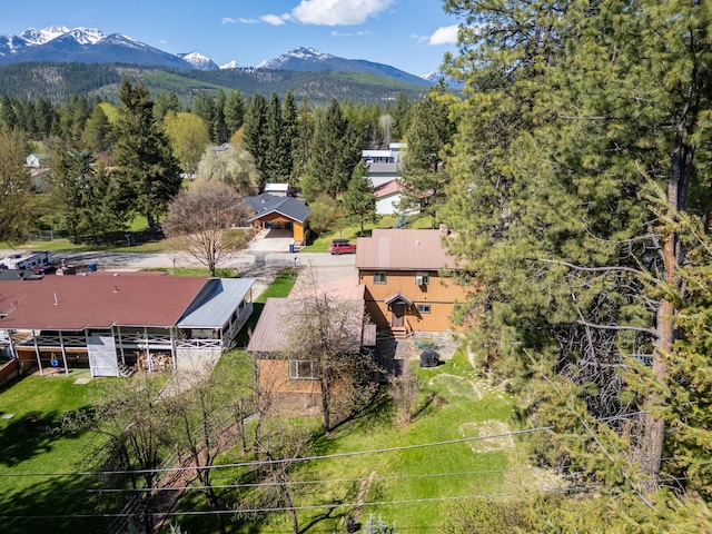 102 Scenery Rd, Libby, MT 59923 - view of subject property featuring a mountain backdrop and a forest