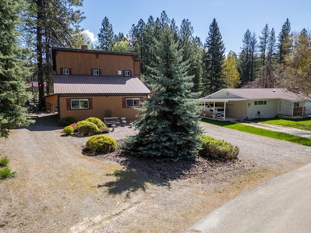 102 Scenery Rd, Libby, MT 59923 - view of front of property with dirt driveway and metal roof