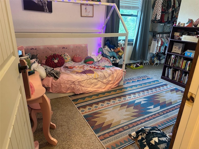 bedroom featuring carpet