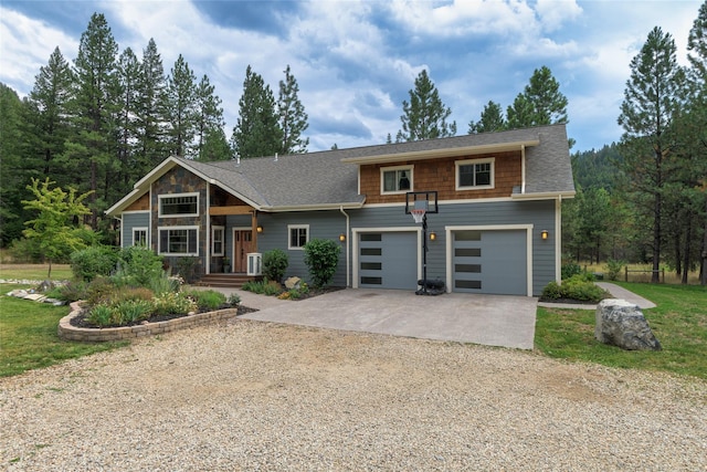 10758 Sleeman Creek Rd, Lolo, MT 59847 - view of front of property featuring gravel driveway and a garage