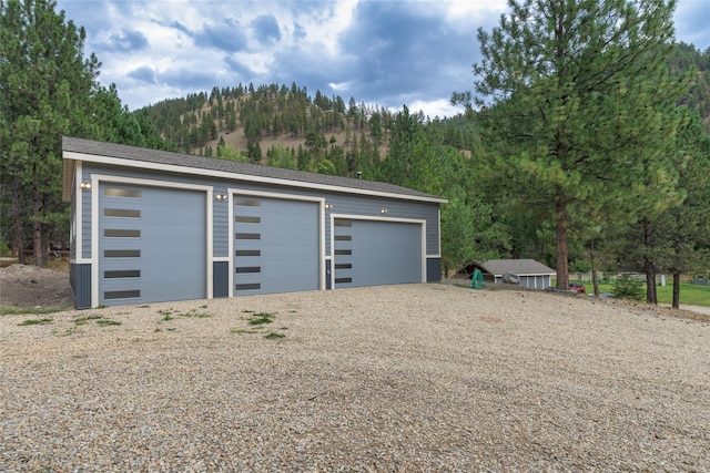 10758 Sleeman Creek Rd, Lolo, MT 59847 - detached garage with a mountain view