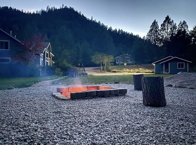 10758 Sleeman Creek Rd, Lolo, MT 59847 - view of yard featuring a forest view