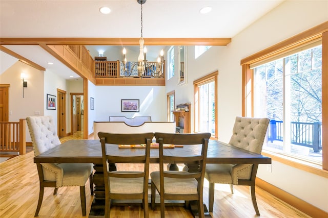 10758 Sleeman Creek Rd, Lolo, MT 59847 - dining space with a chandelier, light wood-style floors, recessed lighting, and baseboards